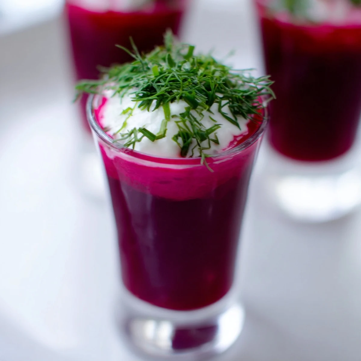 Close-up of a refreshing Quick Barszcz Shooter, perfect as a colorful and flavorful appetizer.