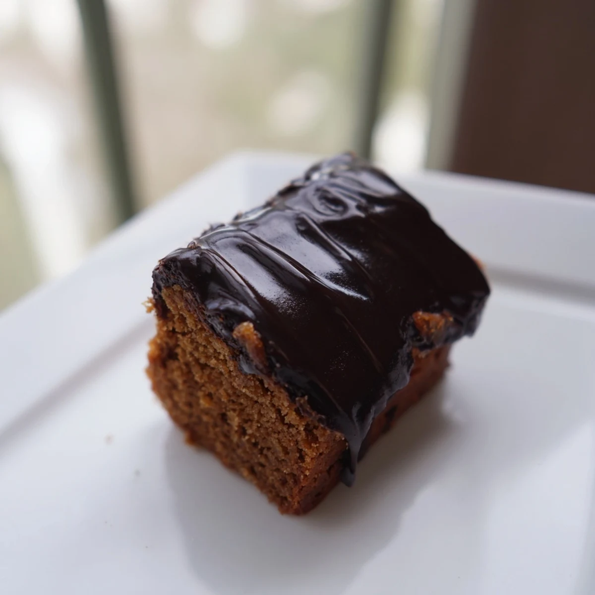 Close-up of perfectly cut Budget Piernik Spice Cookie Bars, showing soft texture and rich spices.