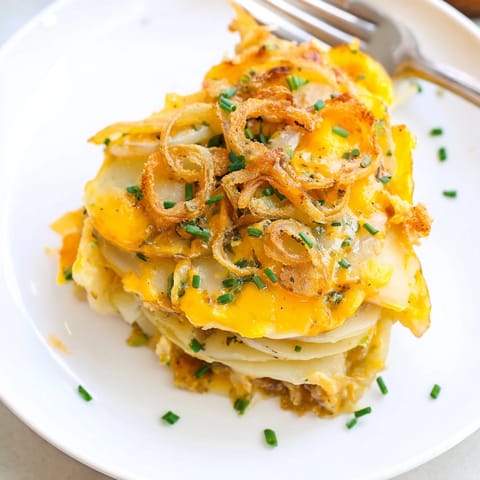 Creamy Pierogi Casserole with Cheese Sauce with melted cheese, baked until perfectly golden.