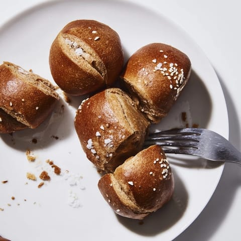 Savory and fluffy caraway rye pretzel bites, ideal for party appetizers or snacks.  