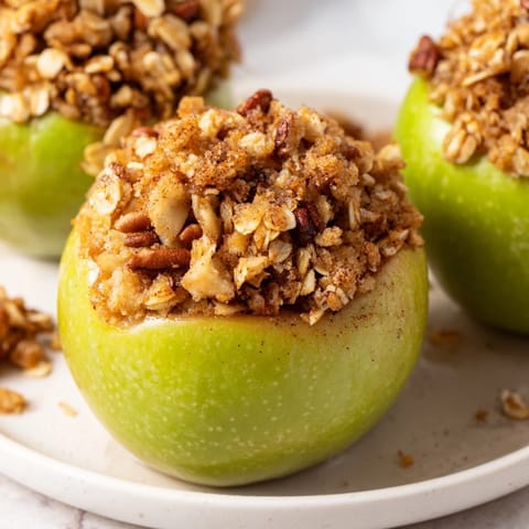 Hearty Baked Apples with Oats & Cinnamon, perfect comfort food, ready for serving.